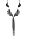 Walk into autumn with natural style. Bar III's leaf-designed necklace highlights a tassel drop with linear crystal accents. Crafted in silver tone mixed metal. Approximate length: 24 inches. Approximate drop: 7 inches.