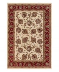 A round rug that is ideal for open spaces. Reminiscent of classic Persian art and culture, this spellbinding rug features a wispy, curvilinear floral pattern in a neutral, burgundy and blue color spectrum. Surrounded by a thin beige border that completes the rug with understated elegance. Easy-care polypropylene ensures durability.