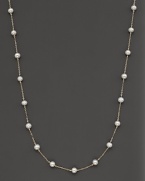 Beaded 14 Kt. white gold necklace with fresh water pearl stations.