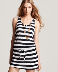 Statement stripes come about on Splendid's nautical tank dress. When it's time to take cover, this drawstring mini is ship-shape worn with boat shoes and aviator shades.