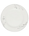 Birch branches grow around this pure white porcelain bread and butter plate from Noritake dinnerware. The dishes of this set turn formal tables into serene landscapes. The contemporary design is refined in polished platinum with a breezy, all-natural beauty.