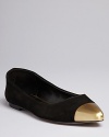 Highlight your point in these ultra-sophisticated Dolce Vita flats, flaunting boldly metallic cap toes.