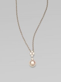 Five dazzling diamonds accent this round Akoya pearl pendant on a sleek 18k white gold link chain. 8MM white, round, Akoya pearlDiamonds, .35 tcwLength, about 18Pendant size, about 1¾ Lobster clasp closureImported 