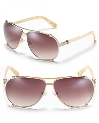 Hit the streets in chic aviator sunglasses by Dior.