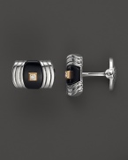 Striking onyx, a glittering diamond and bright 14K. gold enhance the gleam of sterling silver. By Dolan & Bullock. From the Stone Accent Collection.