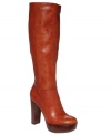 The perfect fashion alibi. Nine West's Escapegoat tall boots feature a smooth almond toe and a chunky, stacked platform and heel.