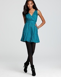 Leave them wanting more in a BCBGeneration dress, featuring a lace back that shows off your sultry side on the way out.