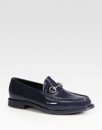 Rubber rain shoe with silver bit detail.Rubber sole embossed with Gucci scriptMade in Italy