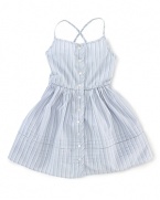 A pretty, vintage-inspired striped dress features a full, gathered skirt for timeless style.