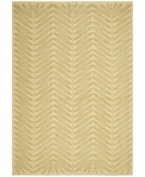 A herringbone pattern of leaves creates a fresh look for the modern home in this unique area rug from Martha Stewart rugs. Hand tufted in India of long wool fibers, this luxurious home accent presents unparalleled comfort and style underfoot.