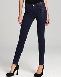 A coated finish lends a leather-like effect to these J Brand skinny jeans, creating a tough-chic look.