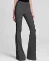 Flaunt chic style with these flared Rachel Zoe pants finished with classic tuxedo stripes.