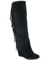 Toweringly tall and wrapped in suede. FALCHI by Falchi's Zoe tall wedge boots feature fringe all the way up the back.