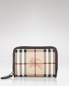 Boasting Burberry's signature check, this zip-around wallet is bursting with classic style.