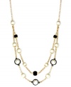 Be bold with some help from Anne Klein. This beaded necklace highlights plastic jet and pearl accents. Crafted in gold tone mixed metal. Approximate length: 16 inches + 2-inch extender.