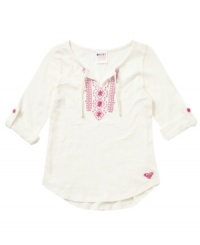 She can sport a beachy style with this cozy looks and feel of this embroidered top from Roxy.