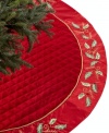 Grand and traditional, the Holly Christmas tree skirt features sumptuous red velvet quilted with a classic diamond motif and a satin border stitched with holly.