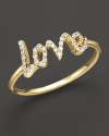 A slim, elegant 14K yellow gold ring set with faceted diamonds. By Meira T.