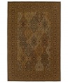 A traditional panel design is woven of supreme New Zealand wool in the Ellsworth area rug in antique tones of mocha, brown, celadon and beige for a truly rich addition to old-world interiors.