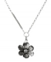 Drape your neckline in pretty petals. This darling flower pendant by Fossil features a silver tone mixed metal setting with clear crystal details. Necklace chain can be worn long or short. Approximate length: 16 to 32 inches. Approximate drop: 2-1/4 inches.