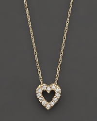 A beautiful diamond heart pendant in 14 Kt. yellow gold, with rope chain.