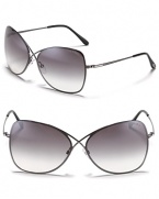 Tom Ford's popular criss-cross silhouette gets a dainty update with thin metal frames and sleek design.