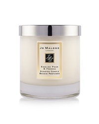 Experience the surprising, sensuous freshness of sweet pears, wrapped in a bouquet of white freesias, on a subtle background of scrambling wild roses and skin-warming amber, pathouli and woods. English Pear & Freesia Home Candle envelops a room and lingers for hours to create an ambience that is fresh and unexpected. Candle burn time is 45 hours.