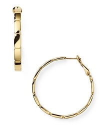 The rich architecture of Park Guell in Barcelona plays muse to these hoops from kate spade new york. Wear them to add a surreal touch of sparkle to every look.