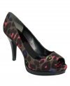 Animal magnetism. Nine West's Danee pumps are definitely an attraction, perfect for a night out on the town. A vibrant tone adds some extra excitement.