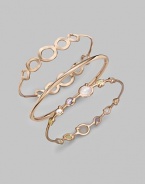 From the Sun Kissed Collection. Each side of this graceful bangle offers a tiara-like array of graduated gemstones in soft pastel shades, prong set in sterling silver and 18k gold finished in rich 18k rose goldplating.Rose quartz, clear quartz, amazonite and green gold citrine18k gold and sterling silver with 18k rose goldplatingDiameter, about 2½Imported