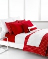 In a spicy palette of white and red, this Denab comforter set from Lacoste features a simple windowpane plaid print for a decidedly bold statement in the bedroom.