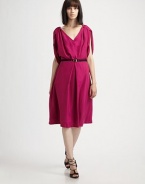 This full-skirted, feminine silk design boasts puffed, capelet-like cap sleeves and a contrasting belt.V necklineSlightly puffed three-quarter cap sleevesIncluded cotton beltInverted front pleatBack keyhole button closureConcealed back zipSilk liningAbout 25 from natural waistSilkDry cleanMade in Italy of imported fabricModel shown is 5'9 (175cm) wearing US size 4. 