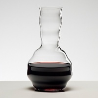 Machine-blown in Germany by Riedel, the world's most-renowned wineglass maker, this decanter fuses form and function, featuring a classic rounded base and sensual lines that graduate up the neck. The pour spout is designed for a drip-free flow, and the beautiful shape also serves to expose wine to more oxygen for a more developed bouquet and fuller flavors.