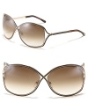 Tom Ford's chic oversized cross frames with openings at temple for a modern style.