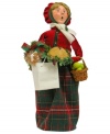 Flushed from all her holiday shopping, this lovely lady juggles a doll, pie and more festive treats, all while singing beloved holiday carols. A very special figurine from the Bearing Gifts family, with the handcrafted charm of Byers' Choice.