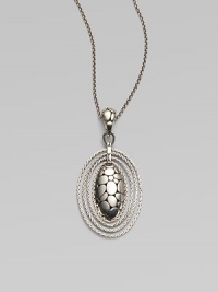 From the Kali Zen Collection. A graceful yet striking oval - with the Kali stepping-stone texture on the front, an open filigree back and rope chain edging - hangs from a sterling silver woven chain. Sterling silver Chain length, about 36 Pendant length, about 2½ Pendant width, about 1¼ Lobster clasp Made in Bali