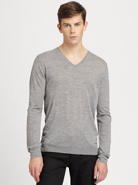 A simple v-neck sweater goes a long way in achieving great style and sophistication and this neatly-shaped rendition is no exception. Knitted from fine merino wool, this pullover is soft and lightweight, making it an ideal choice for seasonal layering.V necklineBanded cuffs and hemMerino woolDry cleanImported