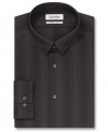 Add depth to your dapper style with this slim-fit tonal dress shirt from Calvin Klein.