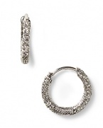 Nadri small pave huggie hoop earrings. Crystal huggie hoop earrings with hinge clasp closure for pierced ears. 0.47 ct. t.w.