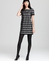 Feminine contrast lace overlay stripes enrich this chic little MARC BY MARC JACOBS dress--a stylish day player that works after hours as well--tights and a pump cinch the look.