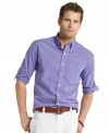 Checked out. This shirt from Izod gives you easy style and comfort so you can turn your focus to the important stuff.