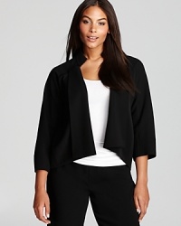 Geometric tailoring and clean lines craft a striking Tahari Woman Plus jacket for a 9-to-5 style infused with modern edge.