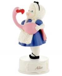 Curiouser and curiouser! This adorable Snowbabies figurine pays homage to the loveable Alice in Wonderland story through a playful depiction of Alice herself.