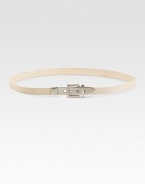 A sleek leather design with a matte metal buckle. Width, about ¾Made in Italy