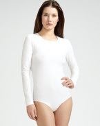 This seamless bodysuit fits like a second skin, in a soft, cotton-rich knit that's so comfortable when traveling. Crewneck Long sleeves Back thong coverage Cotton/nylon/elastene; dry clean Made in Austria