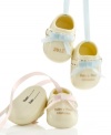 A first step to making your child's first Christmas unforgettable, these baby bootie ornaments are something to treasure in ivory porcelain with fired gold. Record his or her name and the date on its soles.