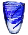 Layered in royal blue and contrasting strokes of black and white, this glass vase is a true conversation piece. A handmade creation that will add zest to any room. Designed by Anna Ehrner for Kosta Boda.