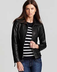 Triple stripes of tonal stitching emphasize the sleek-chic geometry of this KORS Michael Kors leather jacket.