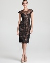 Lace and leopard make a dynamic duo on this ML Monique Lhuillier dress, crafted with seamed details for a modern look.