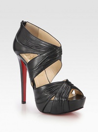 Bands of ruched leather form this sexy silhouette with a sky-high heel and platform. Self-covered heel, 5½ (140mm)Covered platform, 1½ (40mm)Compares to a 4 heel (100mm)Leather upperBack zipLeather liningSignature red leather solePadded insoleMade in Italy